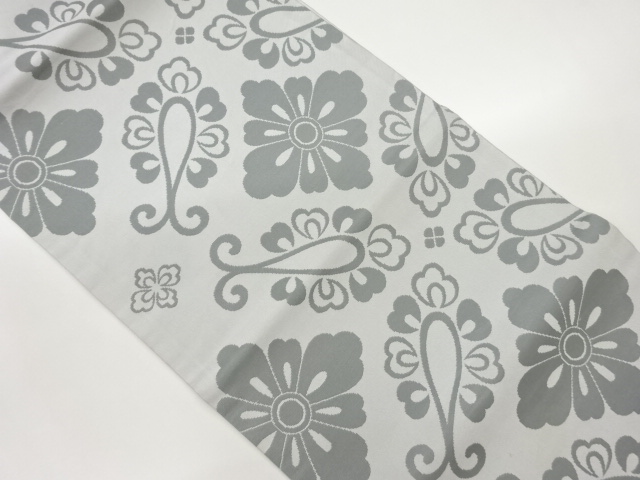 花菱に抽象唐草模様織出し開き名古屋帯（額縁仕立て）